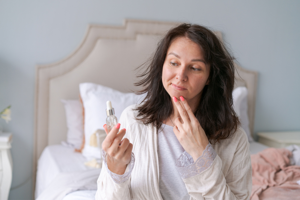 A split-screen image. On one side, a dehydrated, dull-looking face. On the other side, a plump, dewy, and healthy complexion with a dropper bottle of hyaluronic acid serum in the background.